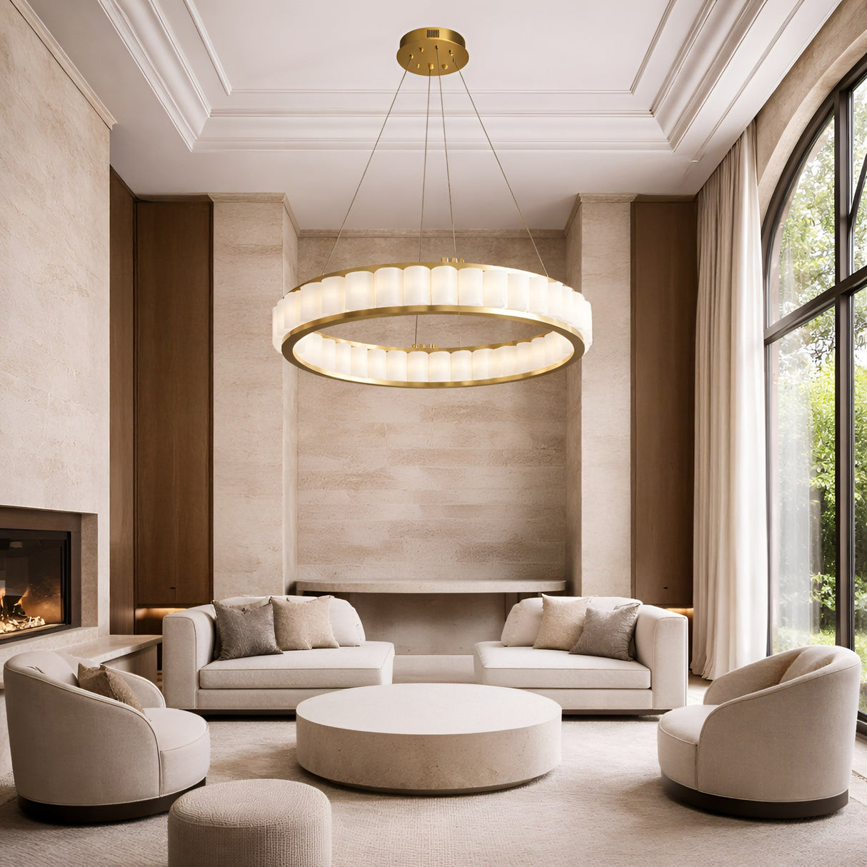 A modern, elegant living room with cream sofas and chairs, a round coffee table, floor-to-ceiling window, light beige walls, and the Orion 36 Light Ring Alabaster Chandelier in soft white & brushed brass hanging from the high ceiling.