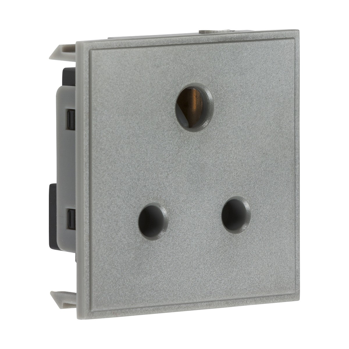 A gray 5A unswitched round socket module features three sockets arranged in a triangular pattern according to the BS 546 standard. The smooth, metallic-finished plate is a euro-module design that fits flush against the wall.