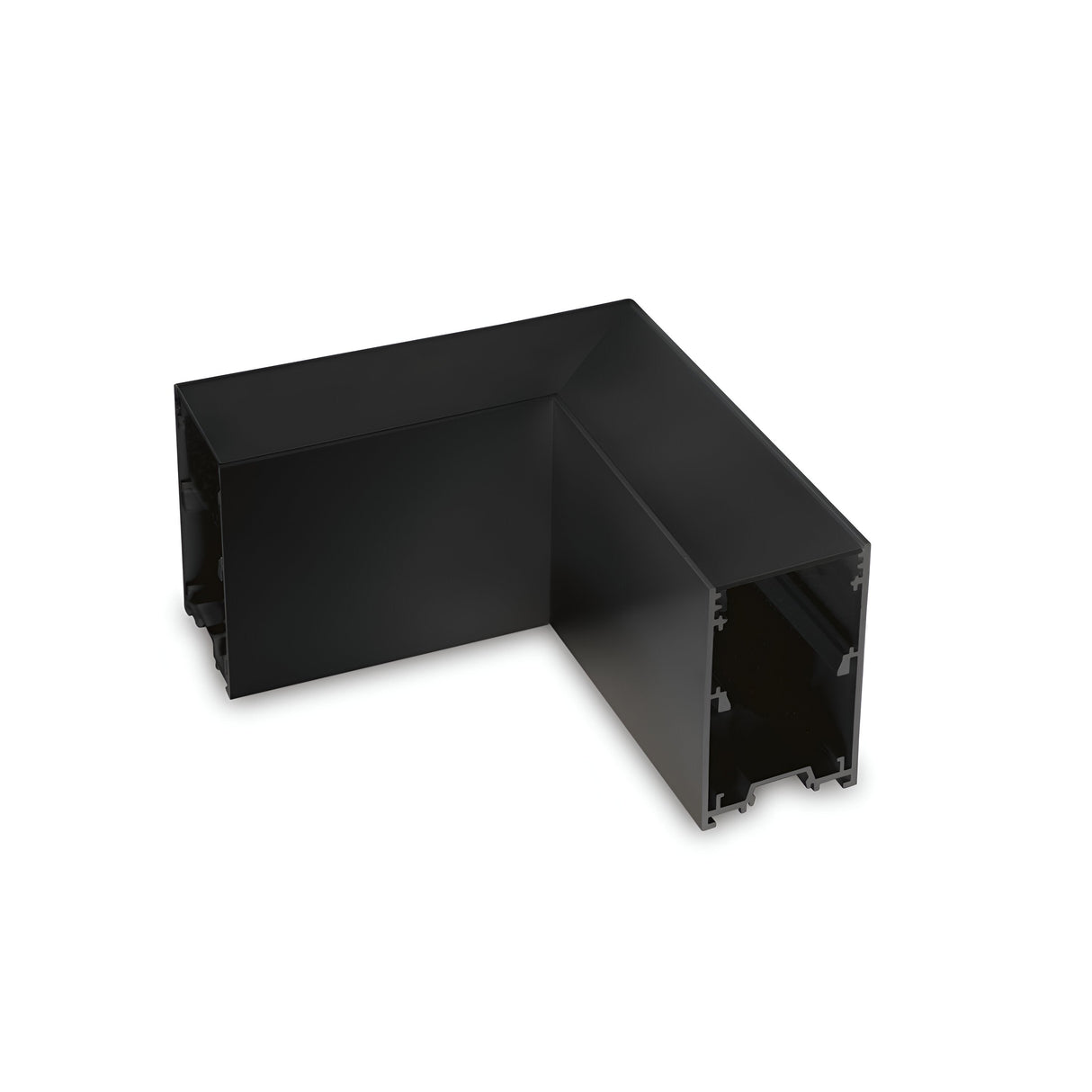 The Sparx Corner Connector - Black, an L-shaped metal bracket featuring hollow sections and crafted from durable aluminum, is displayed against a plain white background. Ideal for structural or construction purposes, this adaptable piece can also serve as a corner connector in a variety of projects.