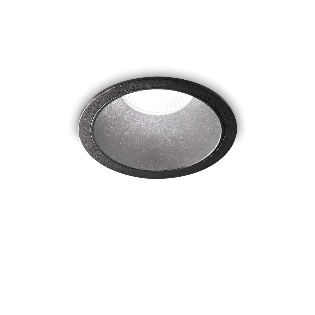 A detailed look at the Sally LED Round Recessed Trim Downlight against a white background, showcasing its energy-efficient design. This 11W black downlight features a circular shape with a glossy surface, offering both style and sustainability.