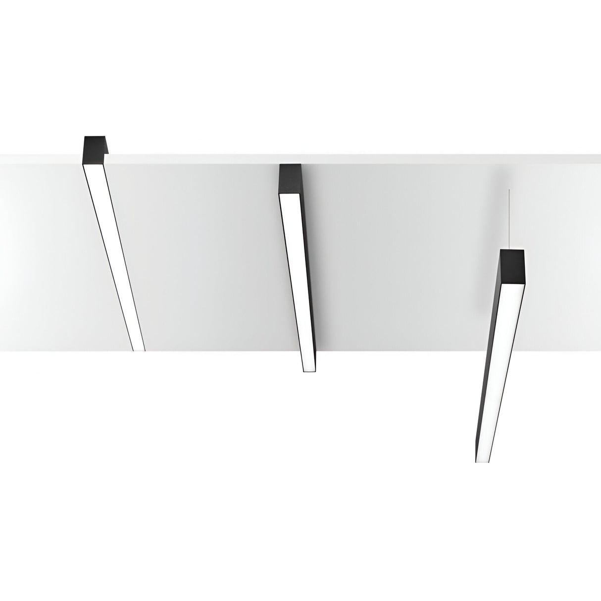 Suspended elegantly from the ceiling, three Sparx Linear LED Suspension Light fixtures create a minimalist design. These lights provide a sleek, modern look with black accents on a white background, delivering energy-efficient illumination ideal for contemporary interiors.