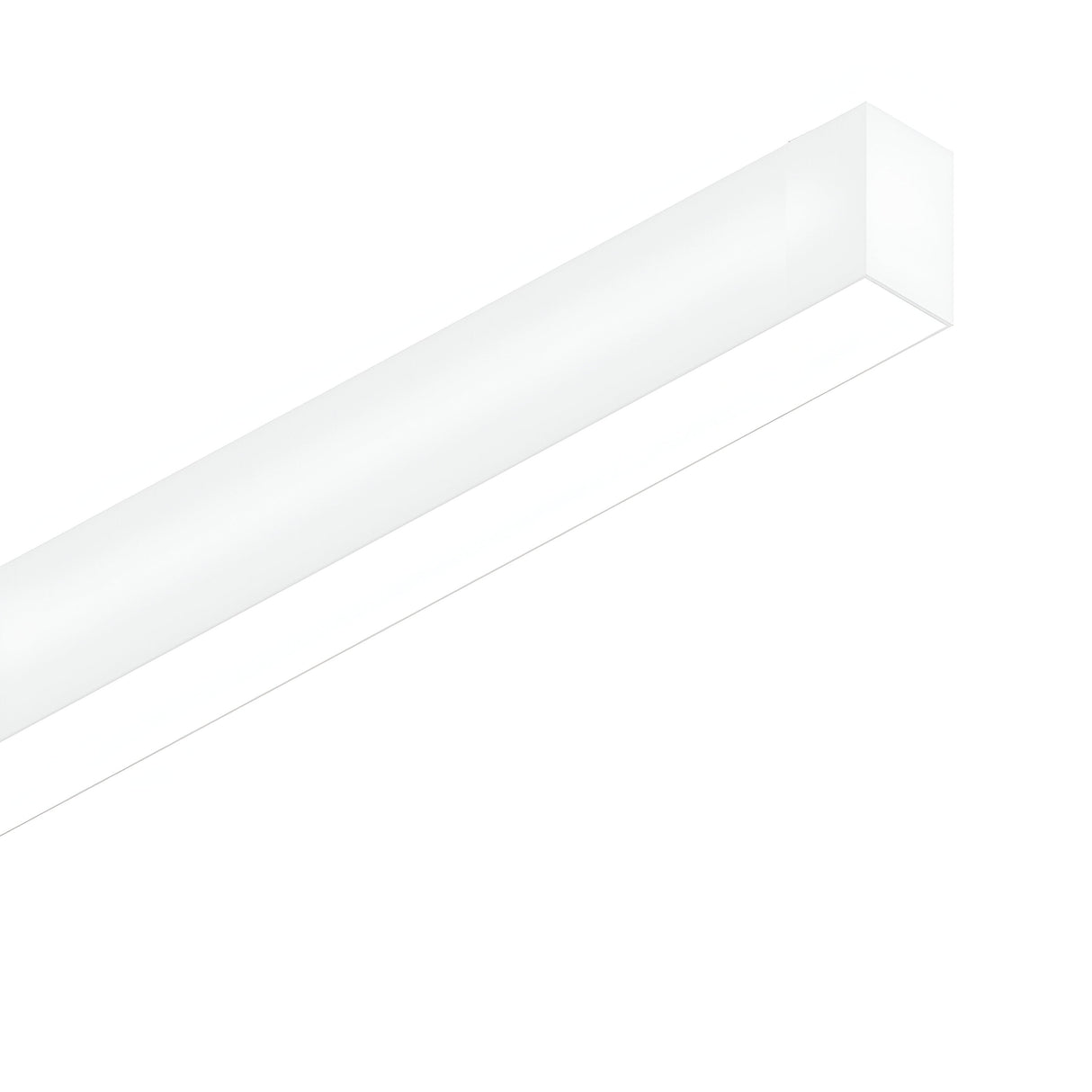 A Sparx Bi-Emission Linear LED Suspension Light, 40W 4000K and measuring 1205mm, is elegantly mounted on a ceiling with a corner view. Its sleek, rectangular design in white features a smooth surface that offers a modern and minimalist look. The bi-emission lighting makes it ideal for contemporary and energy-efficient interior spaces.