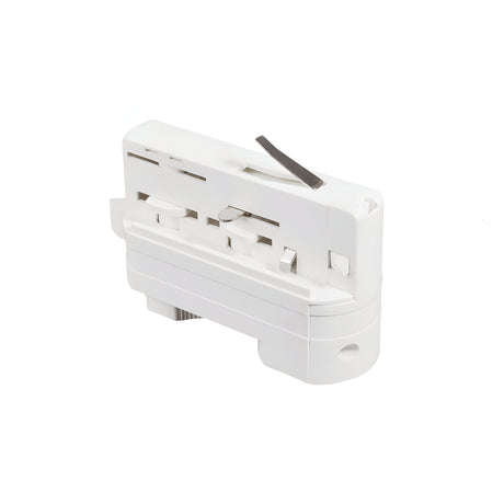 A white, rectangular mechanical component with two circular indentations and a thin, protruding metal strip on top. It includes additional grooves and small openings, indicating that it is the Brillia Track Adapter - White, an essential part of track lighting systems used in indoor settings.