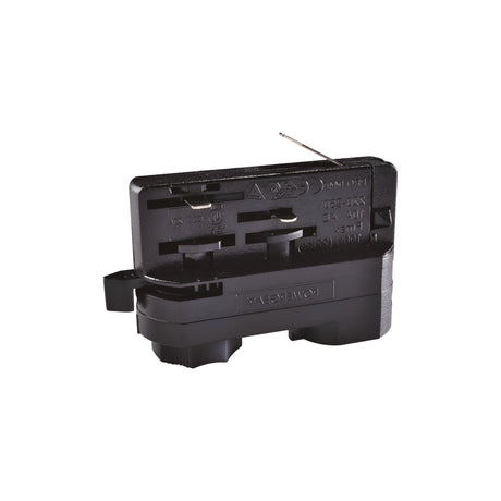 A close-up of the Brillia Track Adapter - Black, an electrical component, showcasing its matte black finish. It features two metal prongs extending from the top. The surface is adorned with molded text and symbols, along with a rectangular shape and detailed grooves.