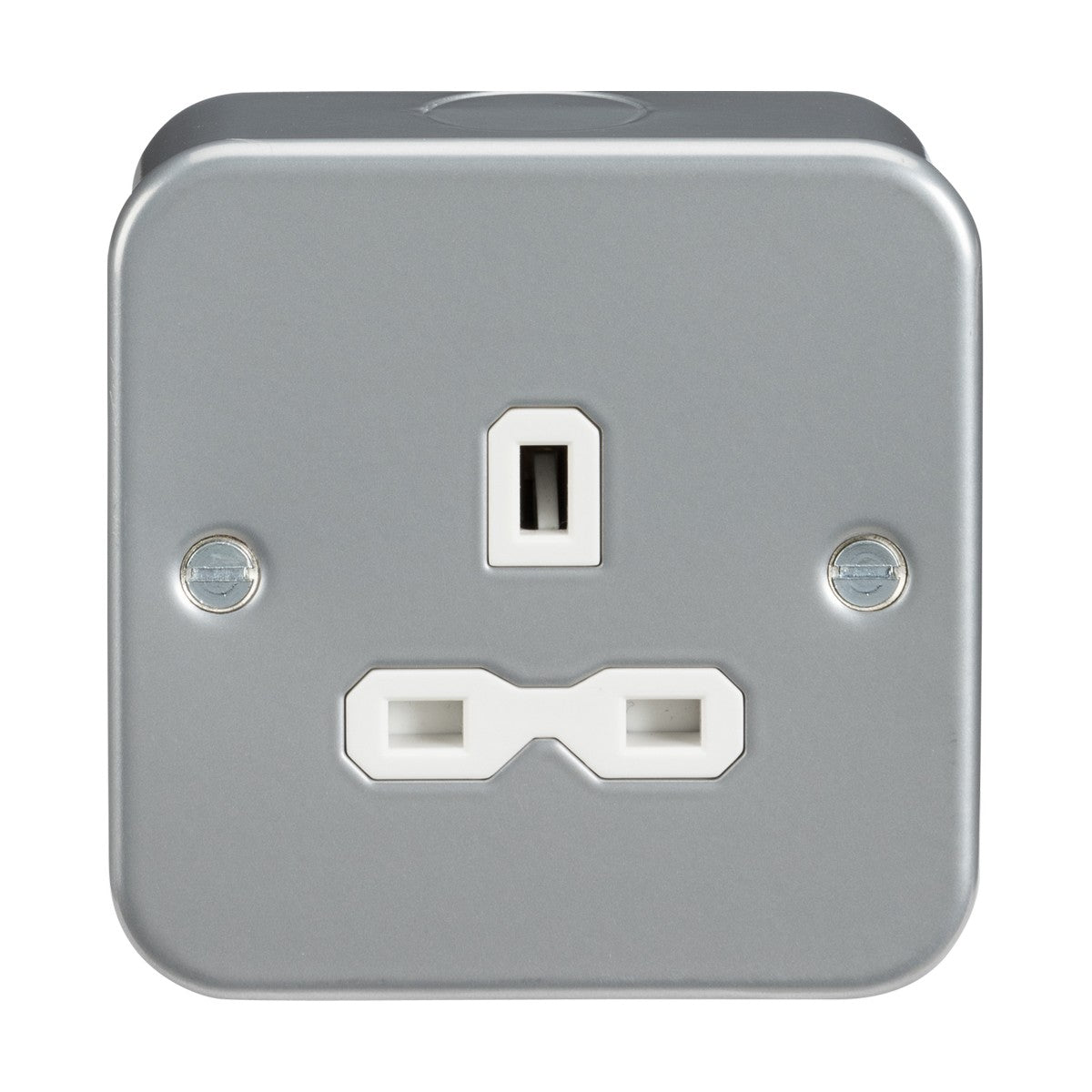 The Metal Clad 13A 1 Gang Unswitched Socket is a metallic, square-shaped electrical outlet made from heavy-duty metal. It features a silver finish with two visible screws on either side and has a three-prong socket design where the prongs are arranged in a triangular pattern with two horizontal slots and one vertical slot.