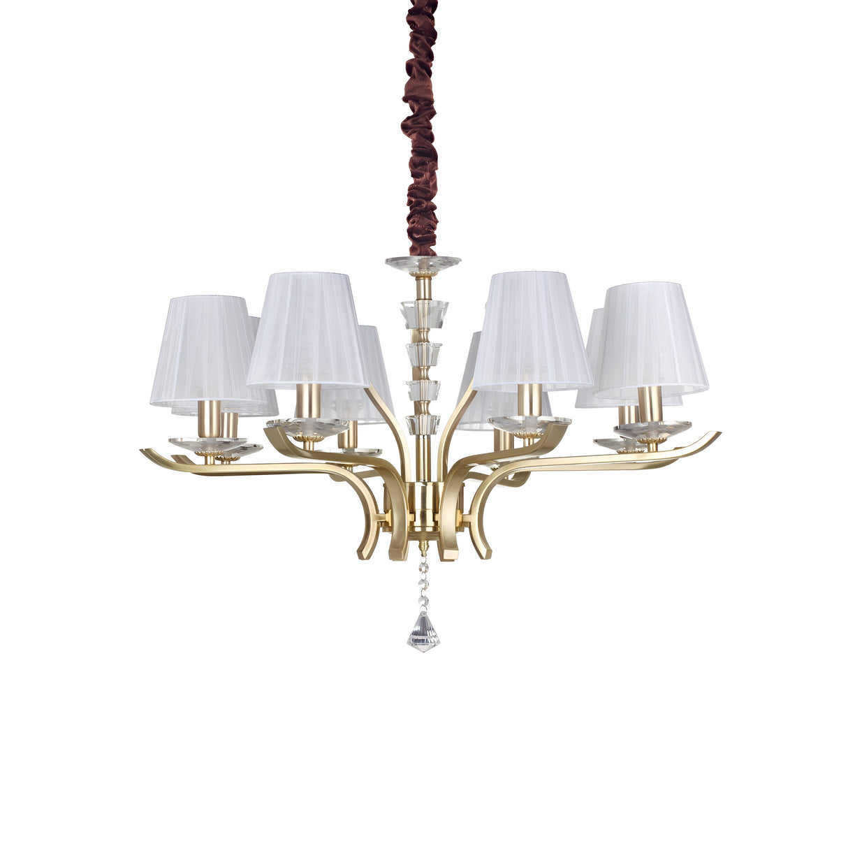 The Solum 8 Light Chandelier - Brass is a luxurious lighting fixture with a satin brass frame, elegantly curved arms, and eight conical white lampshades. It features a decorative chain cover and a central crystal pendant that adds an element of sophistication.