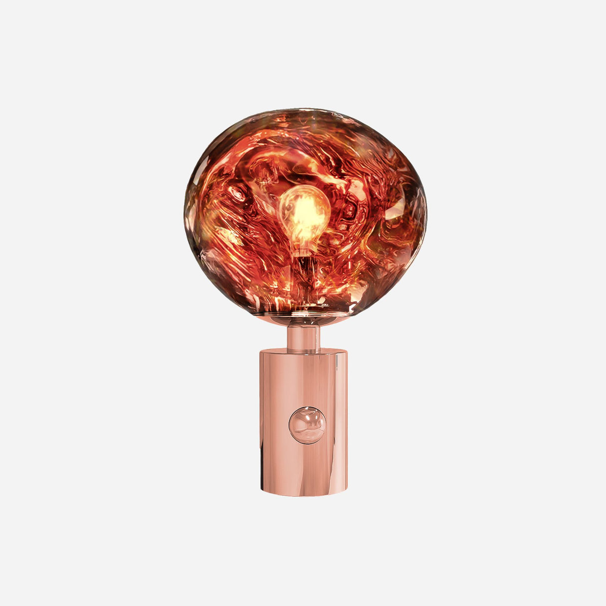 The Ex-Display Lava Table Lamp - Copper features a sleek copper base and a round, swirling amber glass shade, radiating a warm glow against a plain white background.