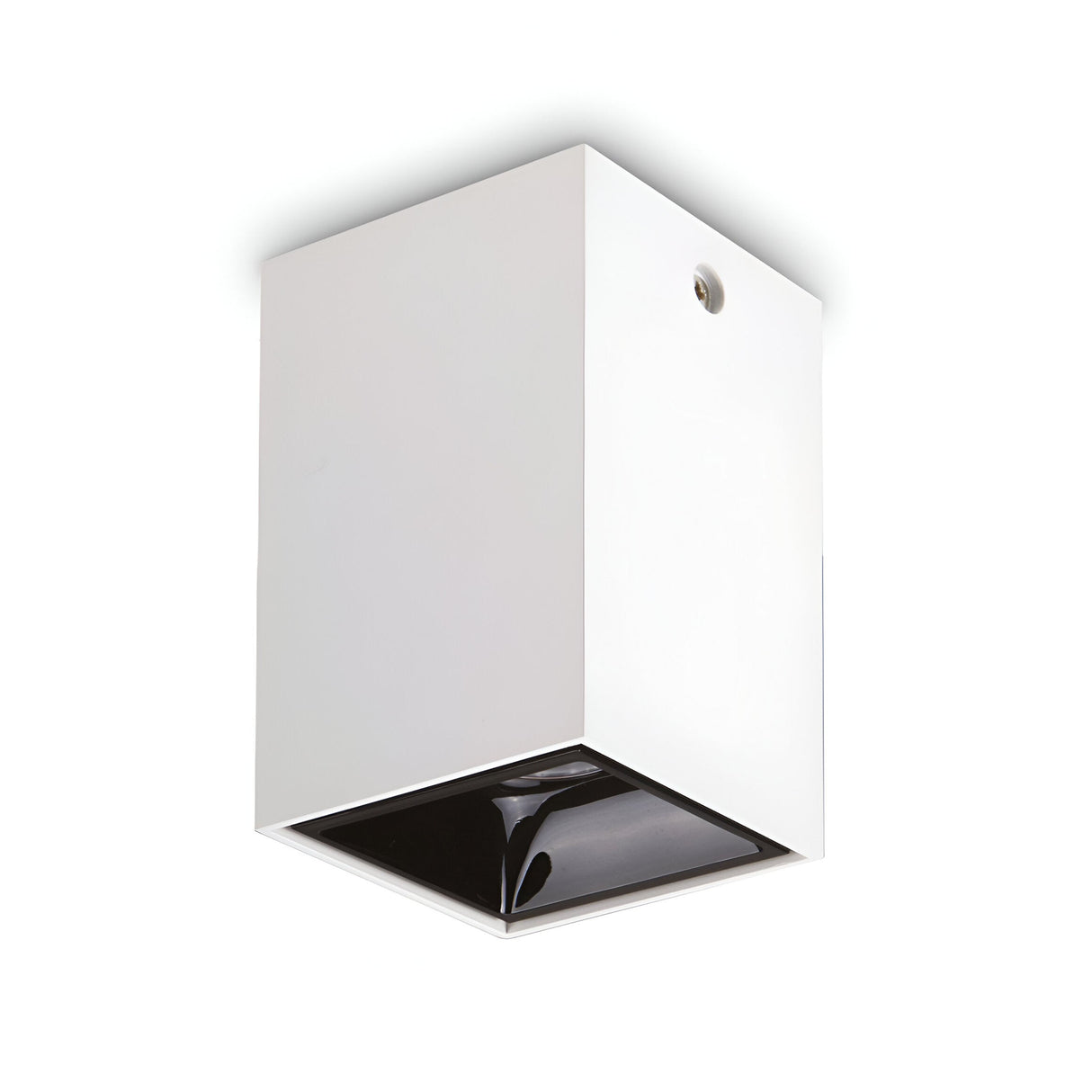 The Lucent LED Square Downlight - White, 7cm is a sleek square ceiling fixture with a recessed black interior, ideal for modern spaces. Its minimalist design and energy efficiency are accentuated by a single visible screw on the side, allowing it to blend effortlessly with any white background.