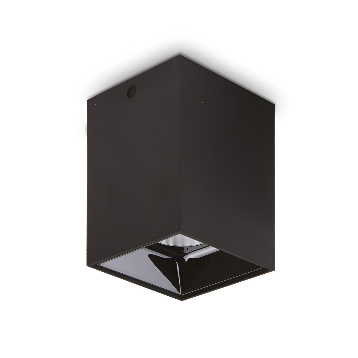 Introducing the Lucent LED Square Downlight in Black, measuring 7cm. This minimalistic ceiling light fixture features a sleek, modern cube shape and a reflective interior. It embodies contemporary aesthetics and energy efficiency, making it perfect for modern decor.