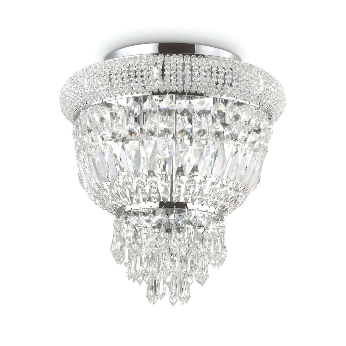 Introducing the Emberlit 3 Light Crystal Chandelier - Chrome, a luxurious crystal centerpiece featuring multiple tiers of sparkling, hanging prisms and a polished metal base. Designed for ceiling installation, this dimmable lighting fixture exudes elegance with its intricate details and reflective surfaces.
