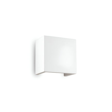 The Vividara-3 Wall Light - White, featuring a minimalist cube design, exemplifies modern lighting when mounted on a light background.