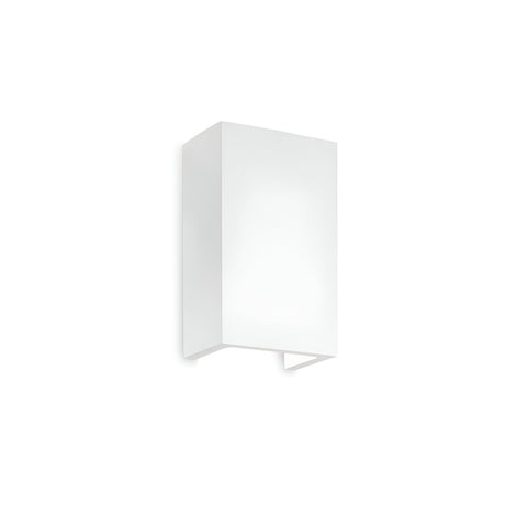 The Vividara-1 Wall Light - White is a minimalist lighting masterpiece, featuring a sleek, rectangular design with an open bottom that is ideal for enhancing modern interiors. Mounted against a plain white background, it captures the essence of understated elegance.