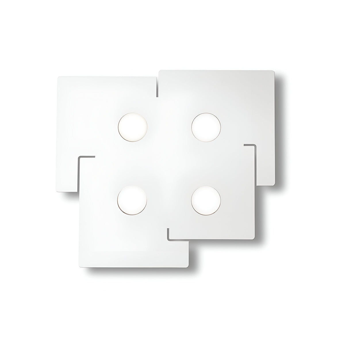 The Emberix 4 Light Ceiling Light - White features a geometric design with four interlocking square panels that have rounded corners and circular cutouts, creating a symmetrical pattern. Its clean and minimalist aesthetic, set against a white backdrop, perfectly complements modern lighting while utilizing energy-efficient bulbs.