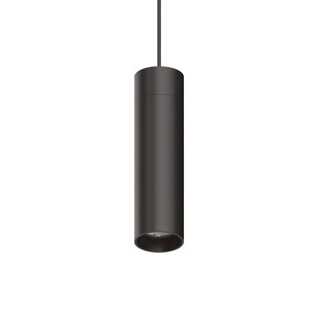The Prismatic LED Track Pendant Light 21W 3000K in Black hangs from a black cord against a plain white background, boasting a sleek, cylindrical shape. Its minimalist design highlights a smooth, matte finish, exemplifying modern lighting and simple aesthetics.