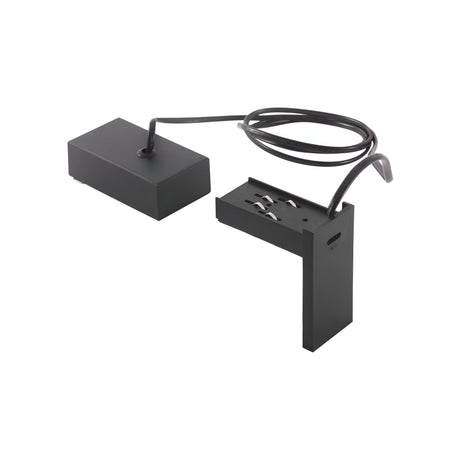 Introducing the Prismatic Electrified Endcap For Track Pendant in black: a minimalist table lamp that boasts a unique L-shaped design with a rectangular base. Its integrated power cord and hollow rectangle body offer contemporary elegance, while the durable polycarbonate construction ensures lasting style.