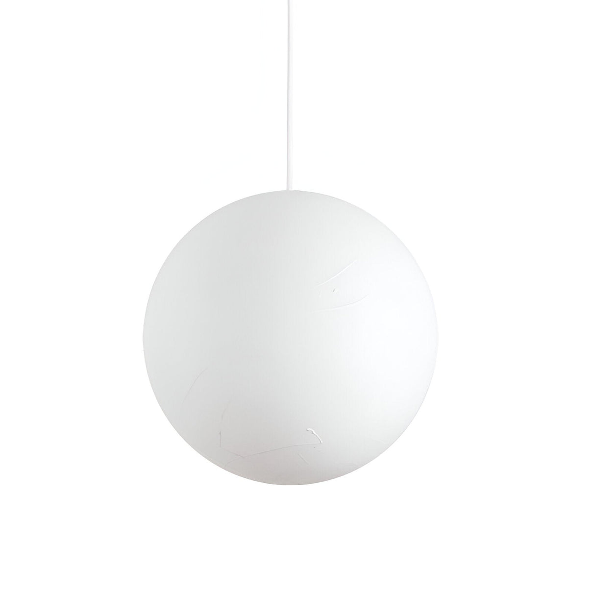 The Gleonis 1 Light Pendant in white, featuring a sleek 30cm spherical design, hangs from the ceiling on a thin wire against a plain white background, providing a contemporary lighting solution.