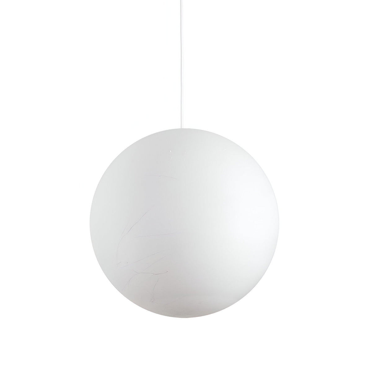 The Gleonis 1 Light Pendant – White, 40cm is a large spherical lamp that hangs from a thin wire against a plain white background. Its smooth surface and subtle shadowing embody contemporary style, providing both elegance and functionality as a dimmable pendant light.