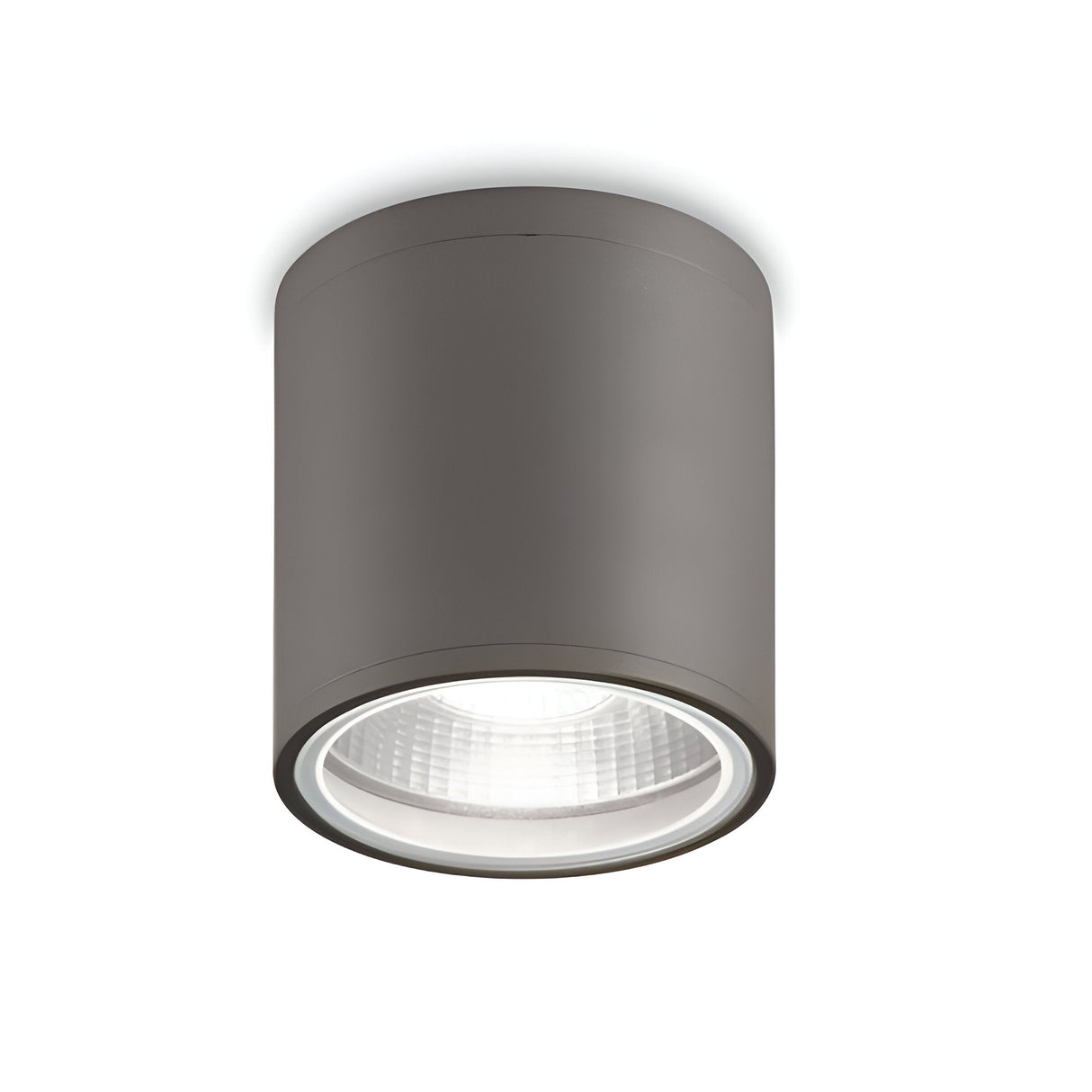 Introducing the Solar Downlight - Anthracite, a sleek and modern ceiling light fixture featuring a cylindrical metallic casing in an anthracite finish, complemented by a wide, clear glass surface that provides downward illumination.