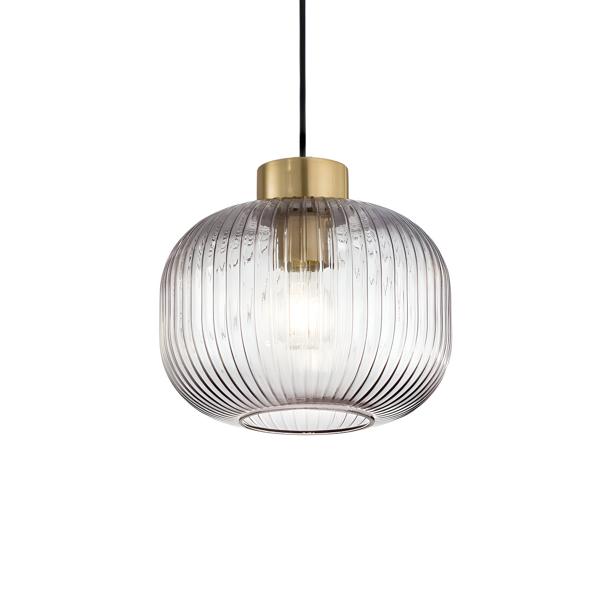 The Fluxia-2 1 Light Glass Pendant - Black showcases a sleek, ribbed transparent glass shade paired with a brass fixture, all suspended by a black cord. Elevate your interior space with this sophisticated glass pendant light, which provides dimmable lighting to create the ideal ambiance.