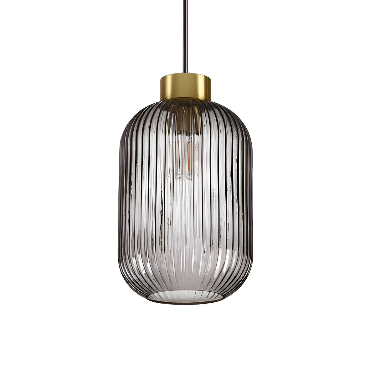 The Fluxia-1 1 Light Glass Pendant - Black is a captivating modern lighting fixture, showcasing a cylindrical glass shade adorned with vertical grooves. Accentuated by a metallic gold cap, this pendant light embodies sleek sophistication as it is elegantly suspended from a single cord.