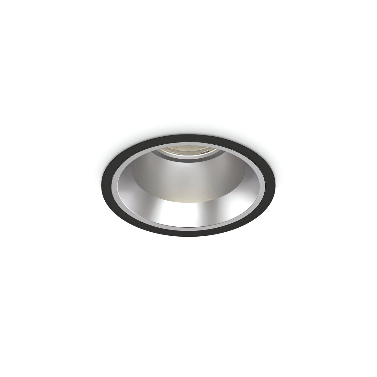 Explore the Zeal Outdoor LED Recessed Downlight - 15W, 3000K, Black, offering a modern circular design. This lighting fixture includes a metallic silver interior paired with a black outer rim set against a white backdrop. Ideal for outdoor use due to its sleek black style and enhanced durability with an IP54 rating.