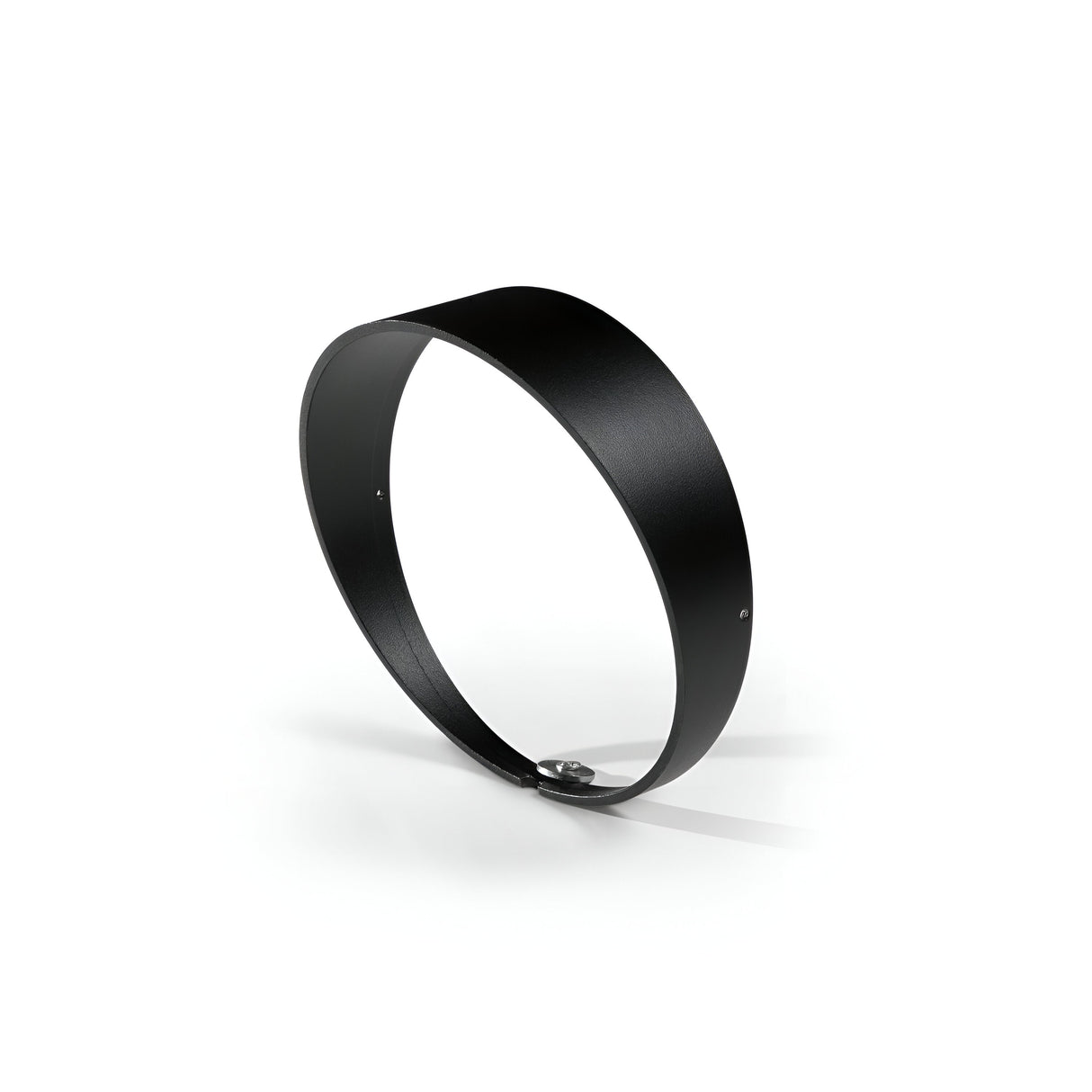 The Lucellalis Outdoor Spotlight Cover - Black is a sleek metal band with a durable aluminium finish, forming a perfect circle that casts a subtle shadow on a plain white background. The small screws featured on the band suggest it might be adjustable or customizable, making it ideal for outdoor use.