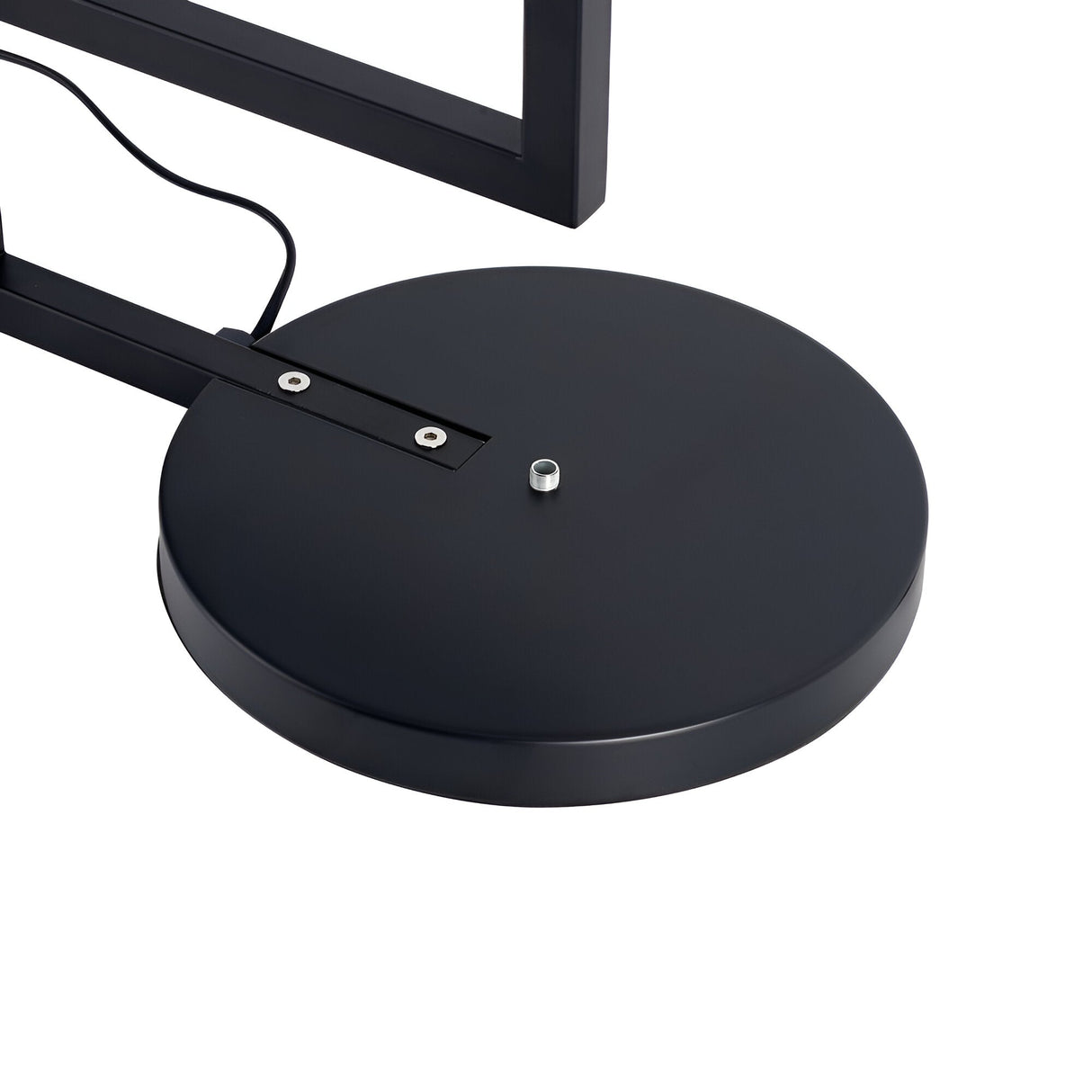 A close-up view of the Ethereal Floor Lamp - Black/White reveals its black circular base with an attached power cord. Set against a black and white background, part of the lamp's arm is visible, highlighting its sleek and modern design.