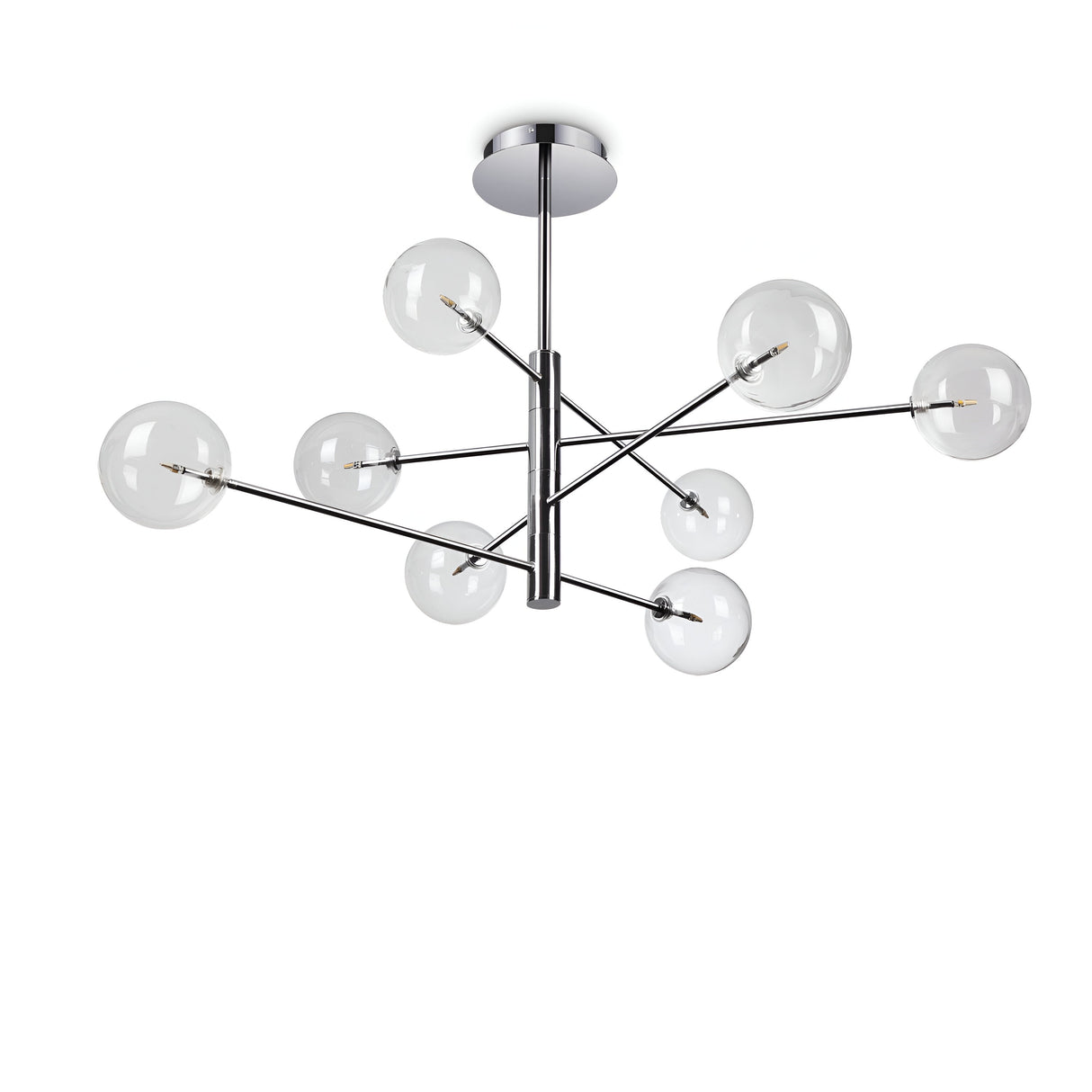 The Solarae 8 Light Suspension - Silver is a contemporary lighting fixture with a polished silver finish and metallic frame. It features eight clear glass globe lights suspended at various angles to create a geometric design. The transparent glass diffusers add an element of elegance, and it is all mounted on a circular ceiling plate.