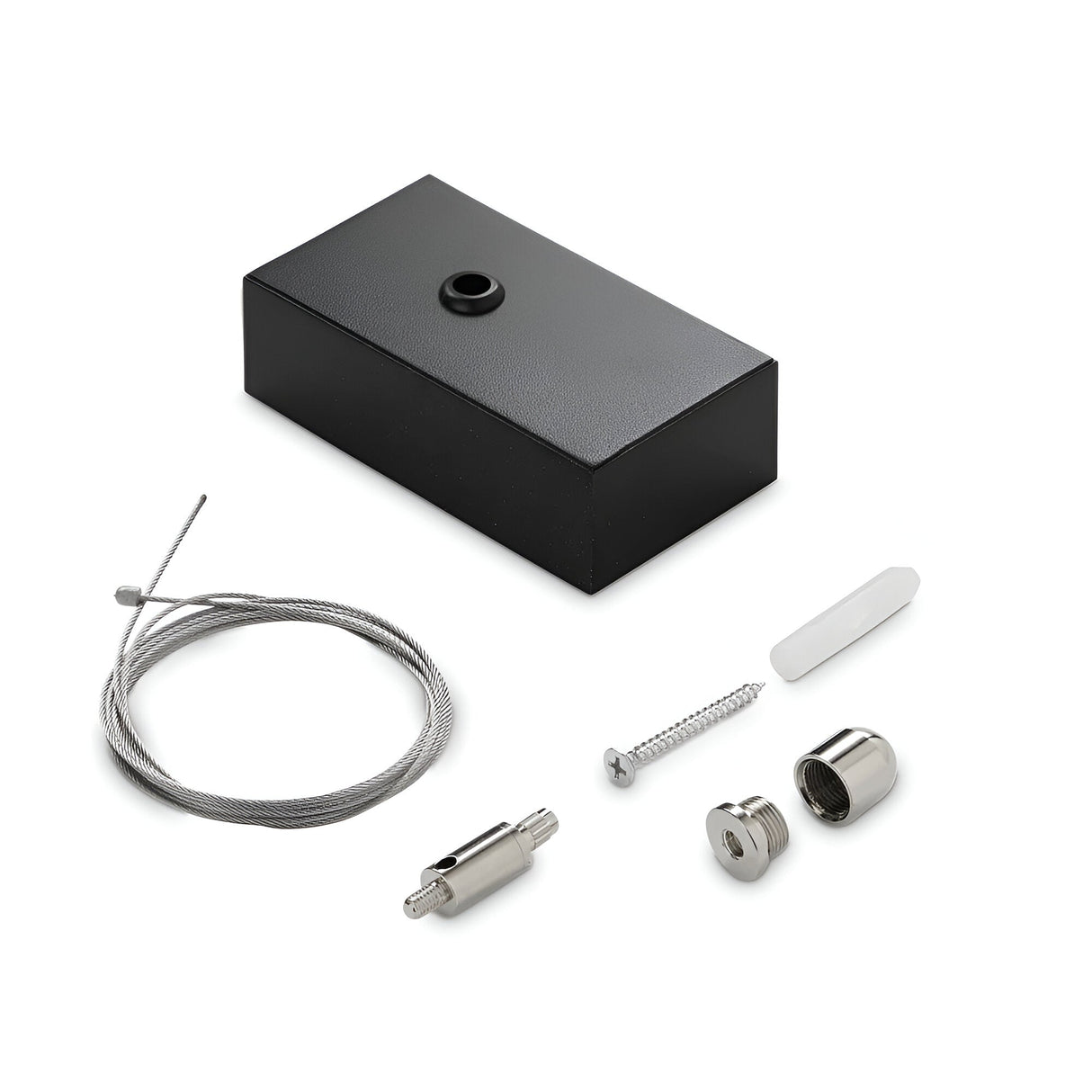 A black rectangular box with a top opening is paired with components from the Ignitia Kit LED Suspension, including a 2m steel cable, a screw, a cylindrical piece, and two small rounded parts, all hovering against the white background.