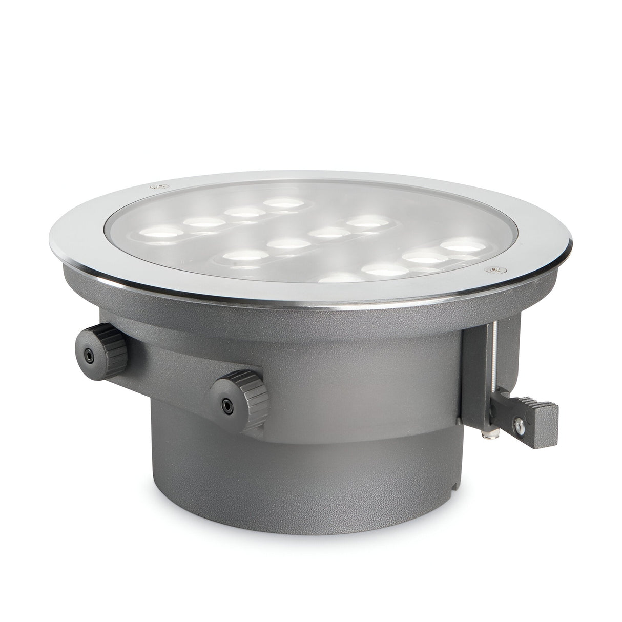 The Zephyra Outdoor LED Round Recessed Ground Light, with a power of 20W and a color temperature of 3000K, features a gray finish and multiple small bulbs beneath a clear cover. It includes two side knob adjustments for easy in-ground installation and boasts an IP67 rating for durability. This product is shown on a white background.