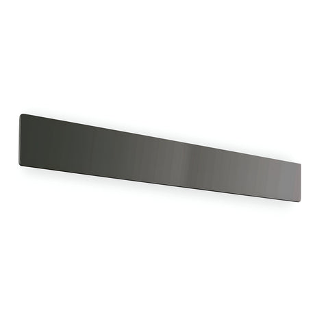 A long, rectangular black magnetic knife strip against a white background is perfectly complemented by the sleek design of the Flara LED Wall Light 30W 3000K - Black, 75cm, adding a touch of elegance.