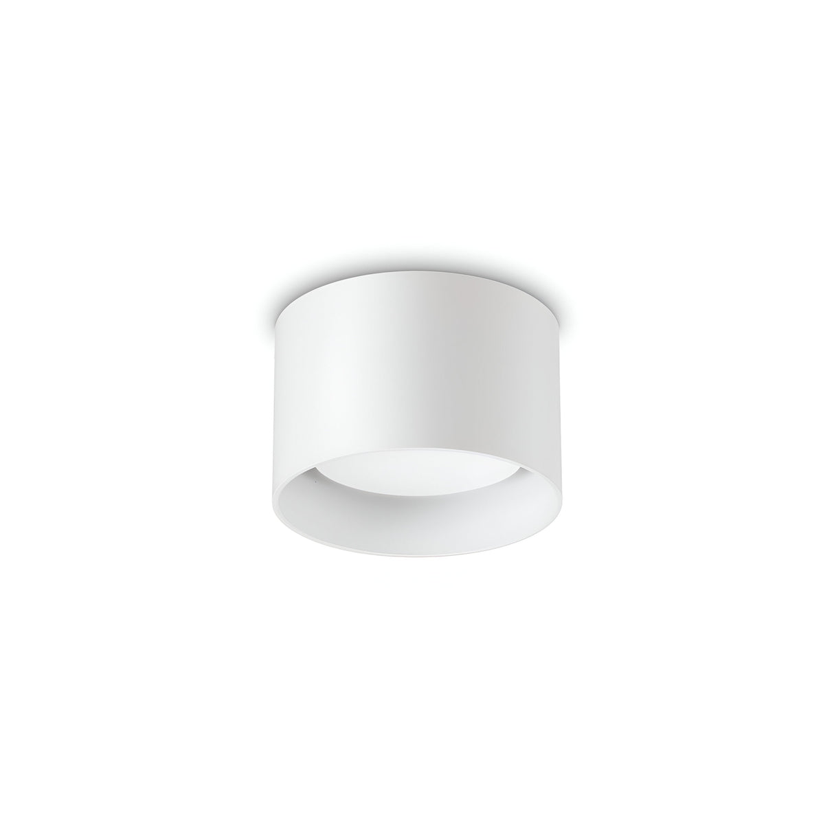 The Orbis Round Downlight - White is a minimalist cylindrical ceiling light fixture made from turned aluminium, with an open bottom and designed to attach to a white ceiling.