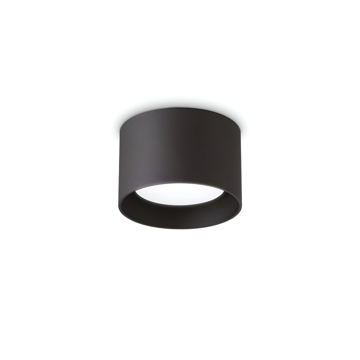 The Orbis Round Downlight in black is a modern and minimalist ceiling light fixture featuring a sleek cylindrical shape and LED lighting. It mounts flush to the ceiling, showcasing a smooth surface and clean lines that emphasize its contemporary design and elegant black finish.