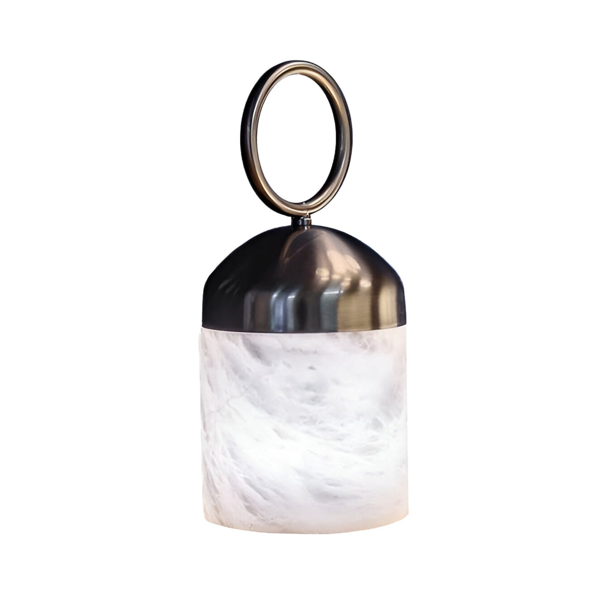The Aurelio LED Ring-Handle Alabaster Table Lamp features a satin nickel top, circular handle, and cylindrical soft white base with a marble-like look—ideal for modern spaces and shown against a white background.