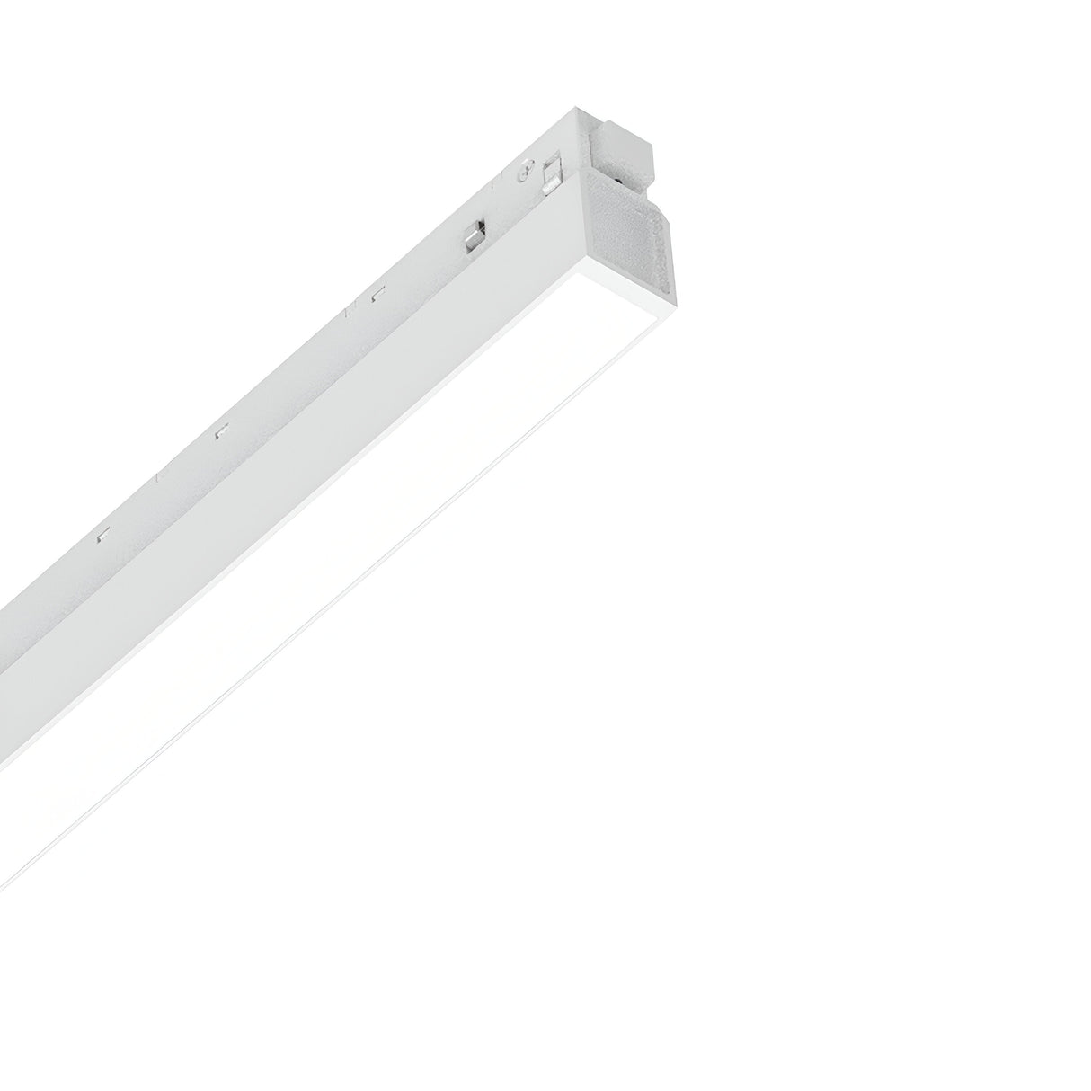 A minimalist, modern ceiling light fixture with a rectangular, white design showcases the Luxeon Wide LED Linear Track Light 26W 3000K On-Off - White. It is turned on, illuminating the plain white background with a bright 3000K white light.