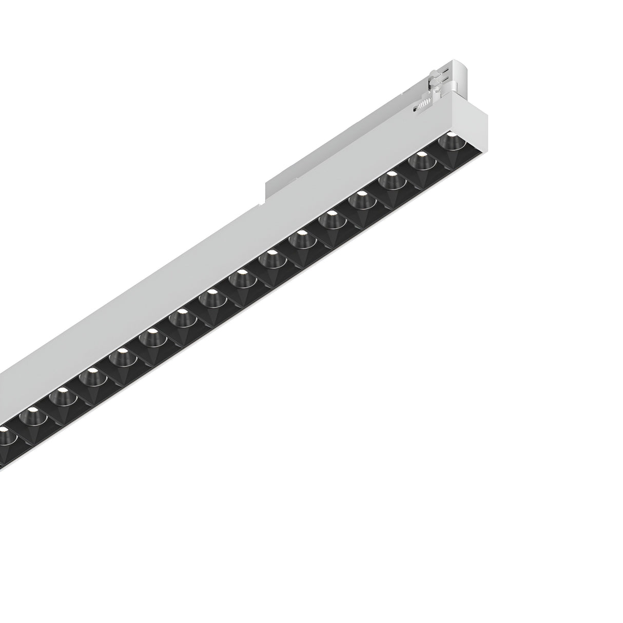 Introducing the Dune 3-Phase LED Linear Track Light, a stylish and rectangular lighting fixture measuring 535mm. This sleek design includes a row of recessed black lights with angled edges, perfect for ceiling installations. Boasting a minimalist white frame, it features energy-efficient LED technology with a 14W output and warm 3000K light ideal for contemporary interiors.