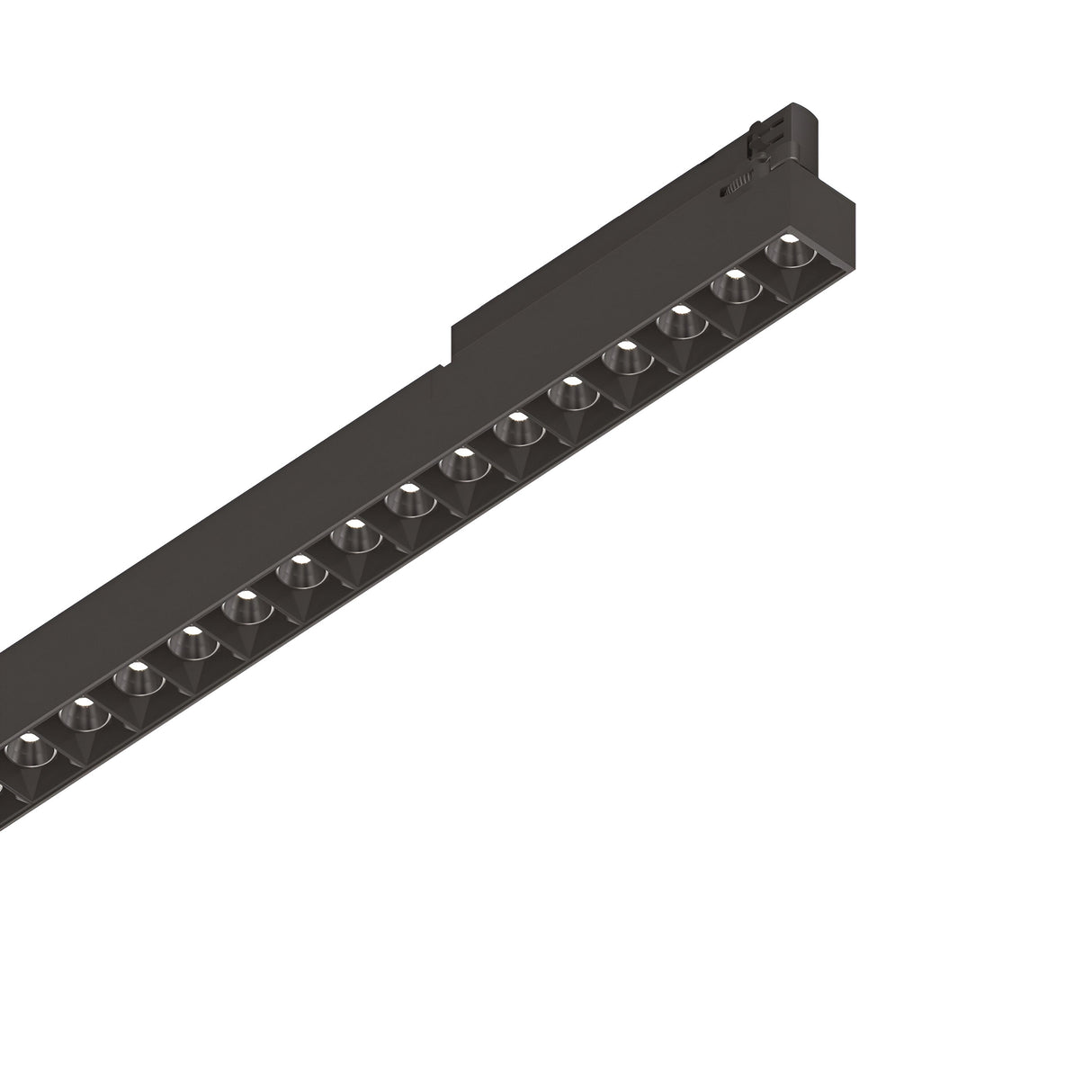 The Dune 3-Phase LED Linear Track Light 14W 3000K in Black, measuring 535mm, features a sleek and modern design with multiple small circular lights aligned elegantly. Captured from a low angle against a simple white background, this energy-efficient fixture transforms any environment with its sophisticated style and outstanding illumination.