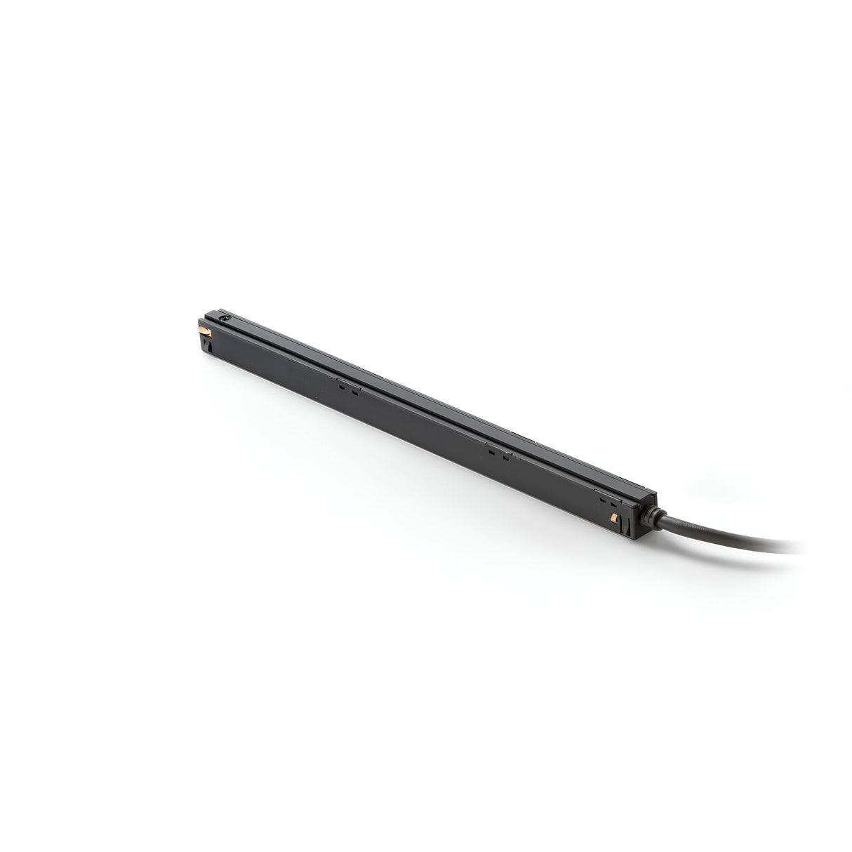 A sleek, long, and thin black Luxeon Constant Voltage Magnetic LED Driver with a cable extending from one end rests on a plain white background.