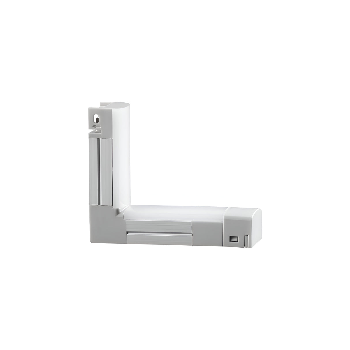 The Nocturne Corner Connector 3000K 1W - White is a sophisticated, L-shaped plastic device with sleek surfaces and subtle grooves, making it an ideal choice for wall mounting or shelving applications. Its minimalistic design includes a small slot and hole on one side, perfect for seamlessly integrating into lighting installations.