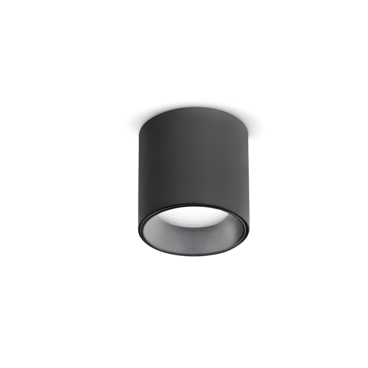The elegant Solace LED Round Downlight 4W 3000K in black, crafted from powder-coated aluminum, is mounted on a white ceiling. It emits a gentle glow downward thanks to its energy-efficient LED technology.