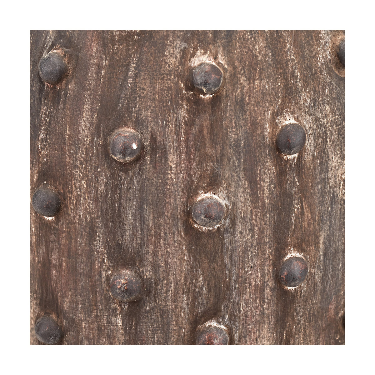 Close-up of the Kali Textured Dot Grey Stoneware Table Lamp Base, 37cm, showing raised circular bead texture on a ridged ceramic surface in a muted grey-brown tone.