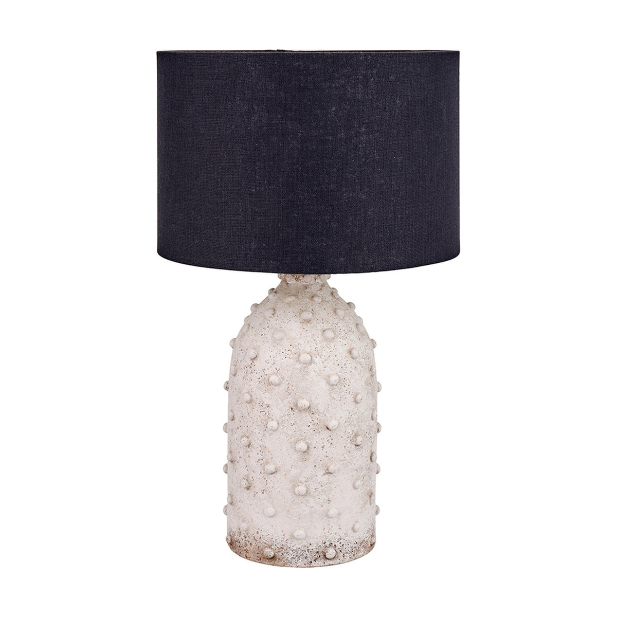 Kali Textured Dot Light Grey Stoneware Table Lamp with a rounded, dotted ceramic base and black drum shade, shown on a plain white background.