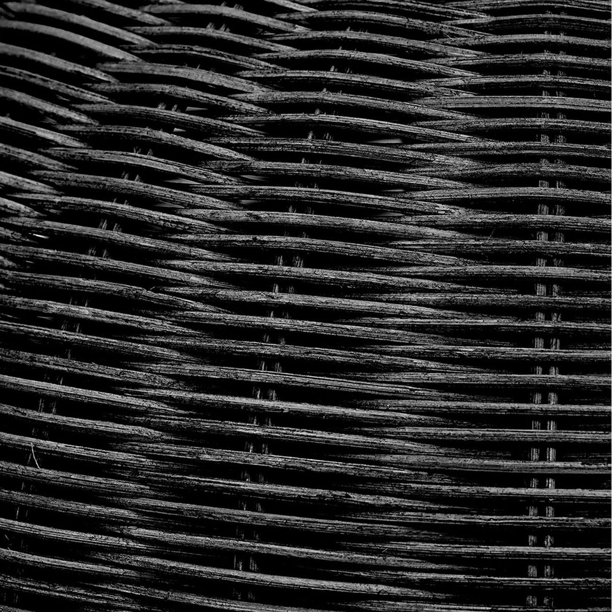 Close-up of the black rattan weave on the Allona Black Rattan Table Lamp, 70cm, showing the woven texture and matte black finish.