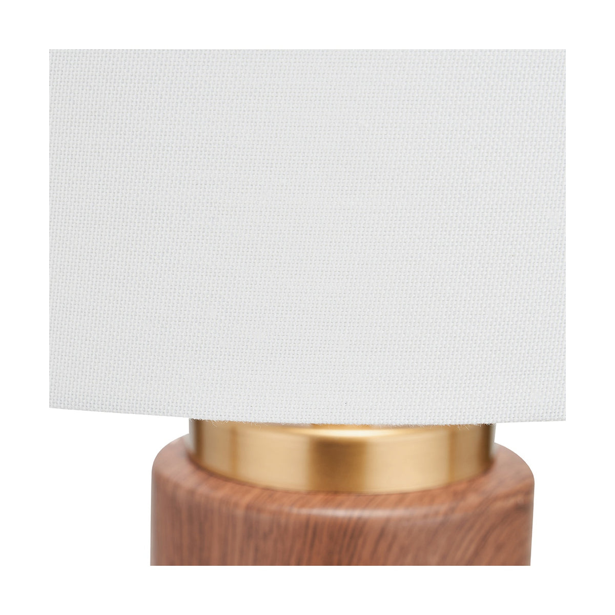 Close-up of the Carrara Wood Effect Ceramic Tall Table Lamp, 55cm, showing a wood-effect ceramic base with brass-tone collar beneath a white fabric drum shade.