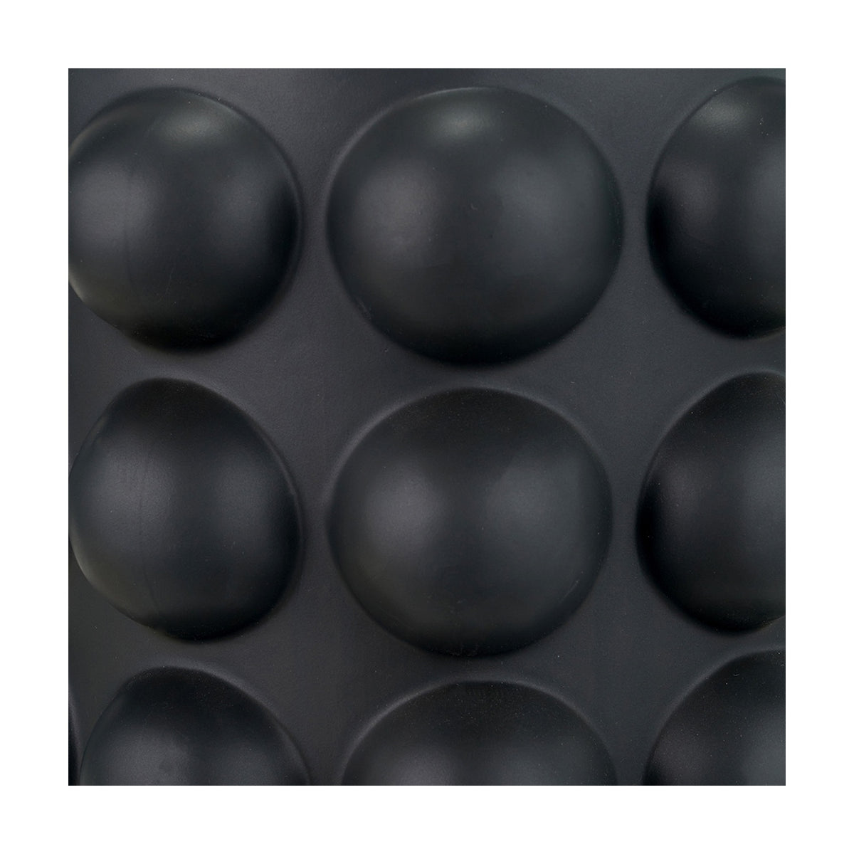 Close-up of the Serenity Black Bobbled Ceramic Large Table Lamp Base, 36cm, showing its matte black textured surface with a raised spherical bobble pattern.