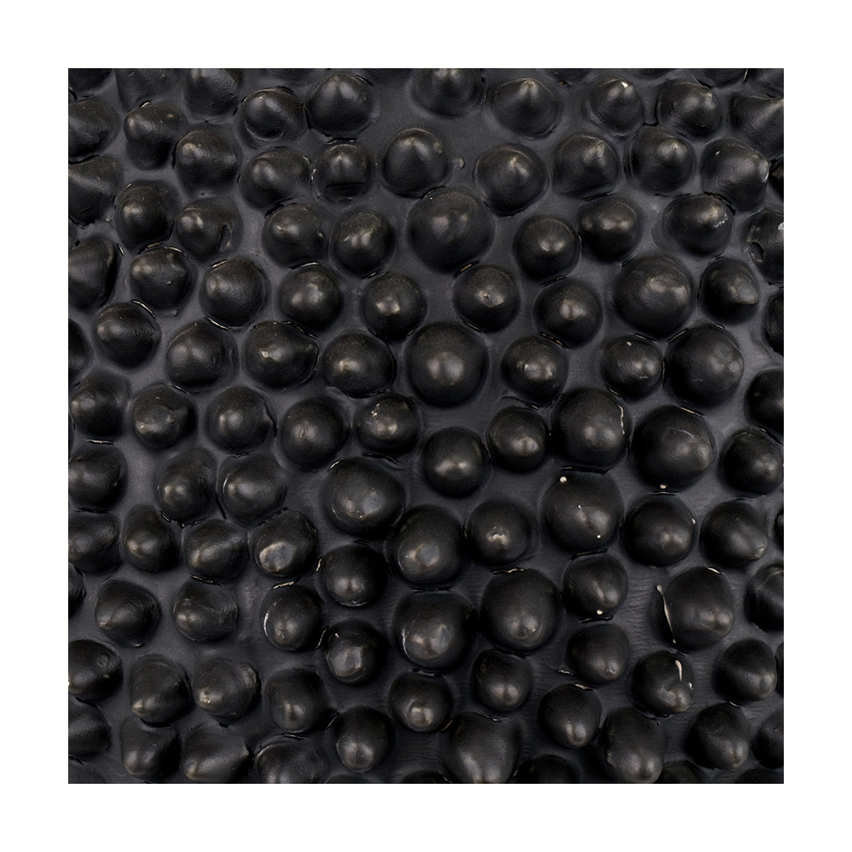 Close-up of the Wrenley Black Ceramic Sea Urchin Table Lamp Base, 37cm, showing its textured, bumpy ceramic surface in matte black.