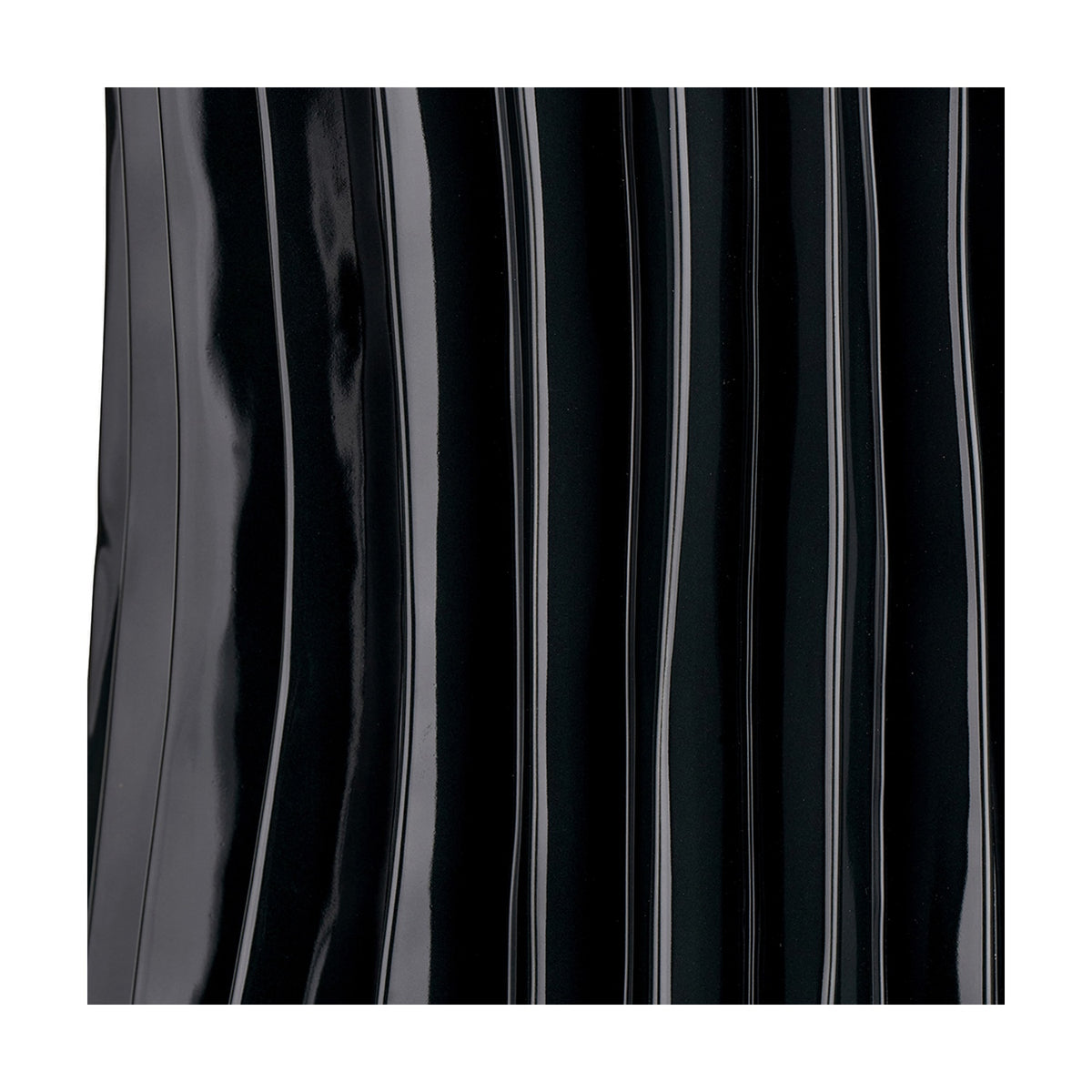 Close-up of the Devony Black Pleated Ceramic Table Lamp Base, 38cm, showing its vertical ridged texture in a glossy black finish.