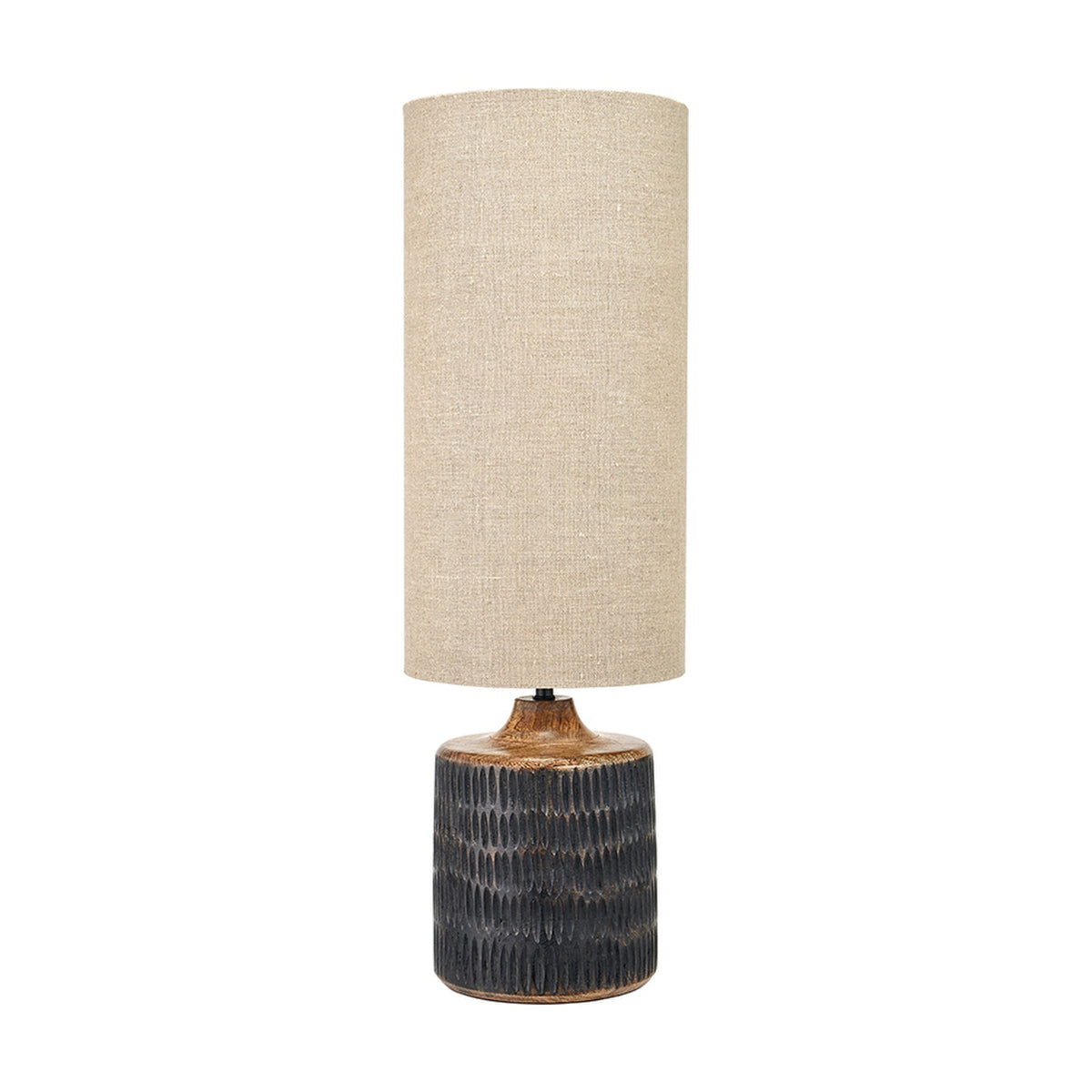 Alaric table lamp, 77cm, with a textured antique black mango wood base and tall cylindrical natural linen shade, shown on a plain white background.