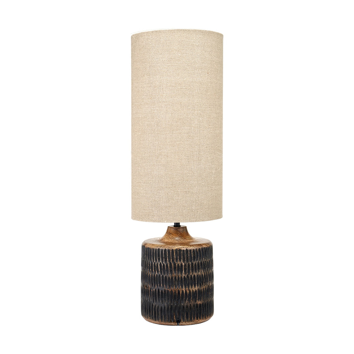 Alaric table lamp with a textured antique black wash mango wood base and tall cylindrical natural linen shade, shown against a plain white background.