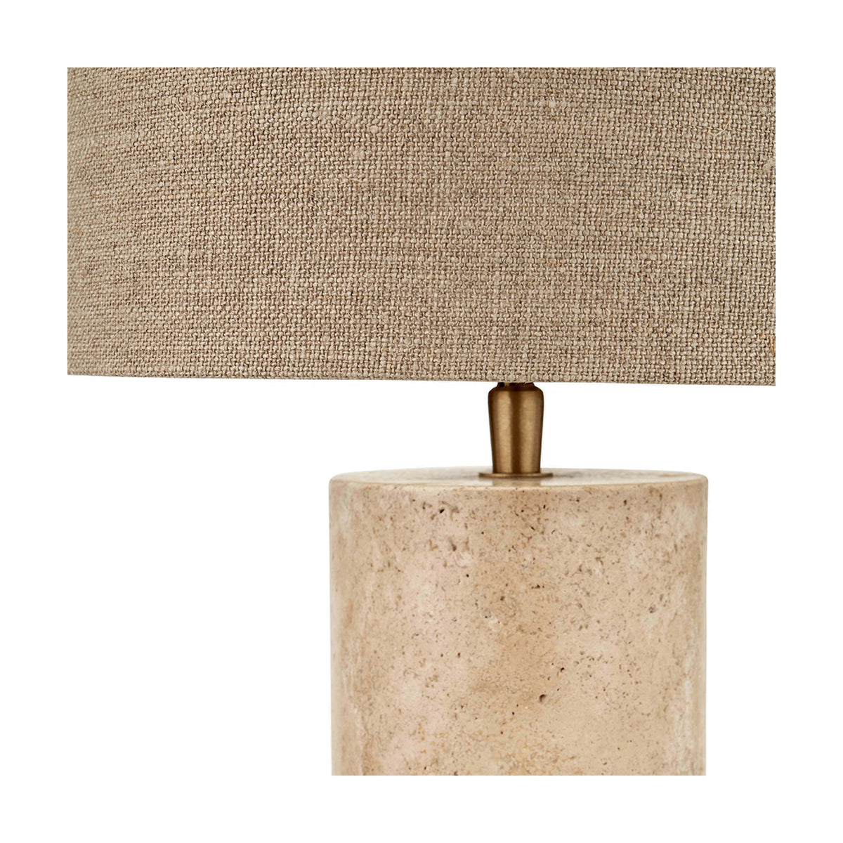 Kanoa Limestone Cylinder Table Lamp with a rectangular linen shade and brass gallery detail atop a natural stone cylindrical base, shown on a plain white background.
